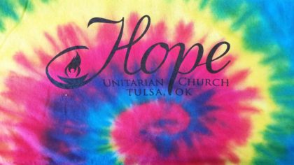 A tie-dye swirl that says Hope Unitarian Church