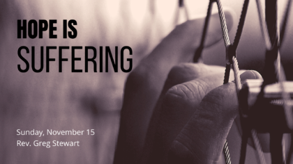 A hand grips a chain-link fence. Text: Hope is Suffering - Sunday, November 15 - Rev. Greg Stewart